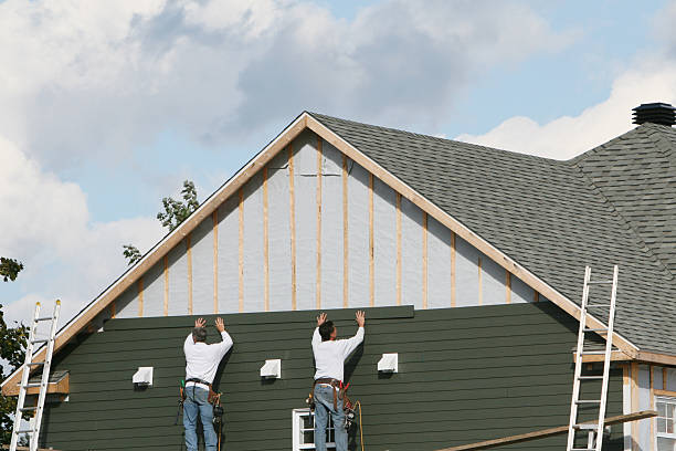 Professional Siding Repair technician working in Townville, PA